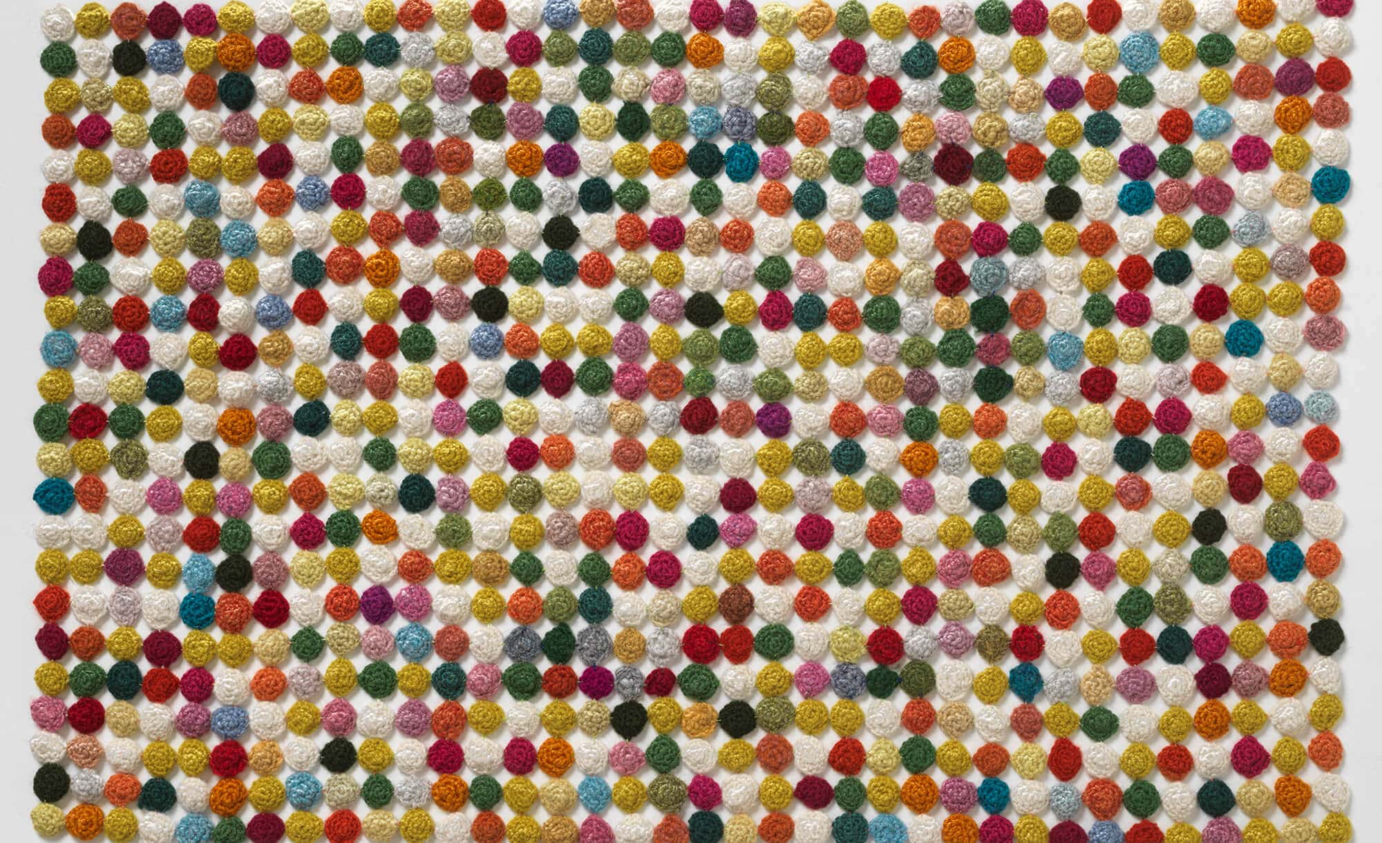 Happiness / Jaettu ilo, 2024. Wool, crochet, 40 x 60 x 1 cm.